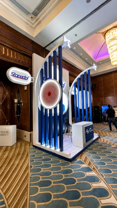 Stopadol blue and white exhibition booth